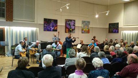 Audience enjoying a concert at Benslow Music